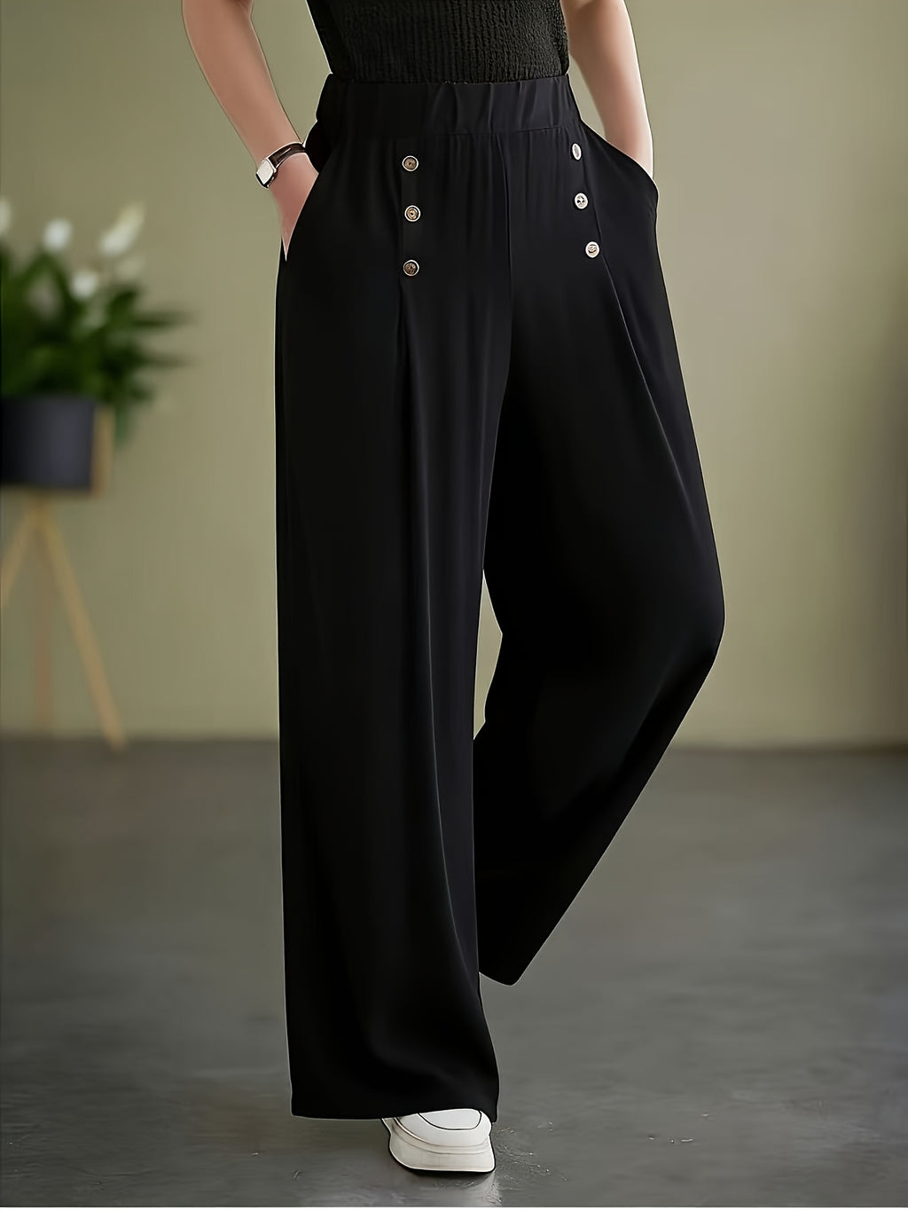 Pantalon grande taille, coupe évasée, poches plaquées, porté de face