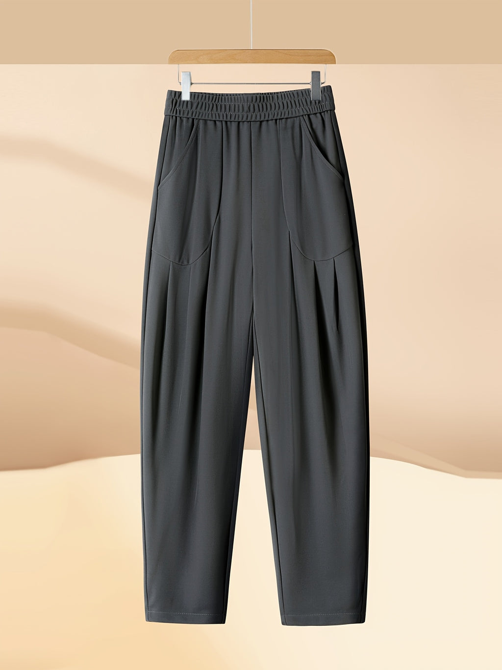 Pantalon carotte grande taille — Maille drapée et plis creux