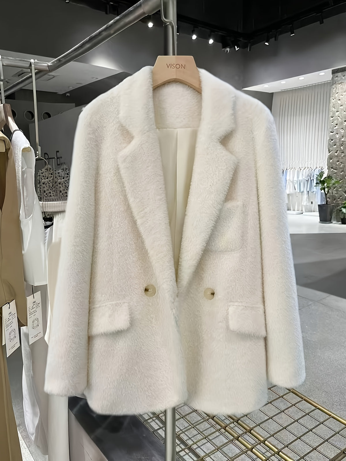 Manteau grande taille, coupe oversize, col à revers, boutonnage