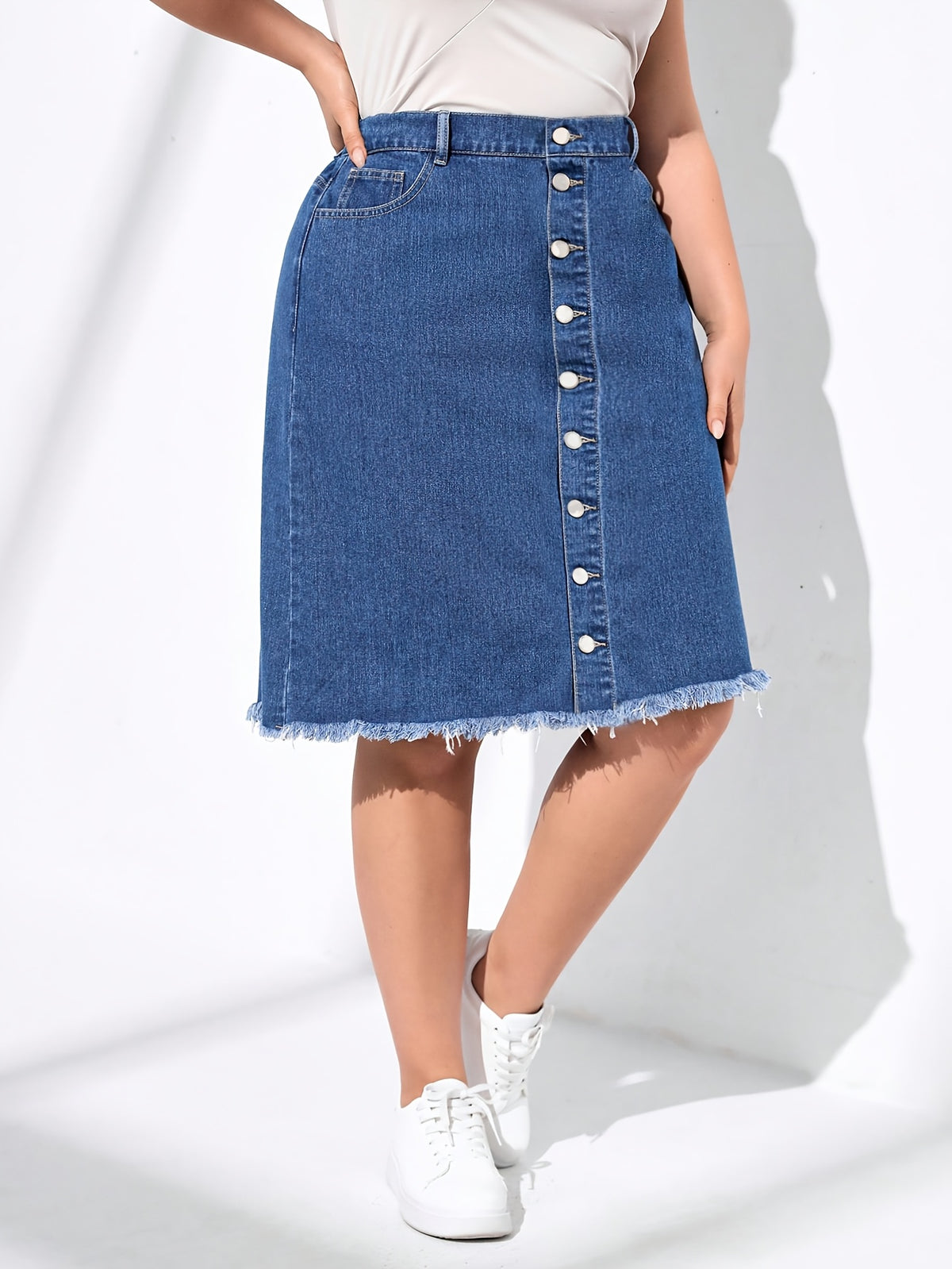 Jupe grande taille, coupe oversize, longueur genou, tenue franche — composition : 85% Coton, 15% Polyester