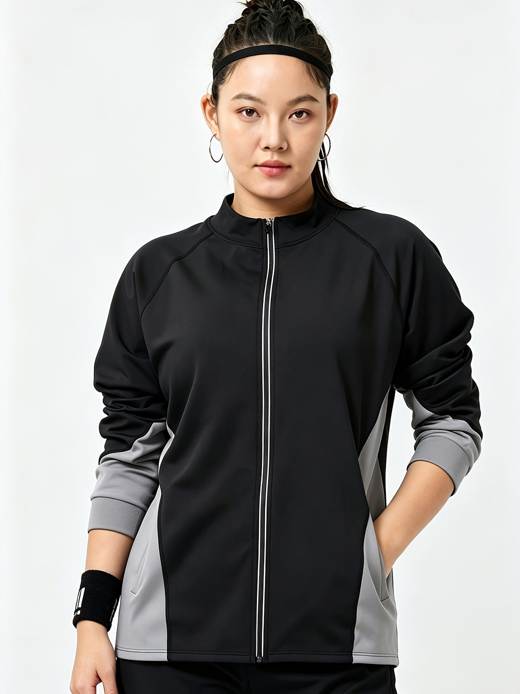Veste grande taille, coupe ample, manches longues, vue de profil