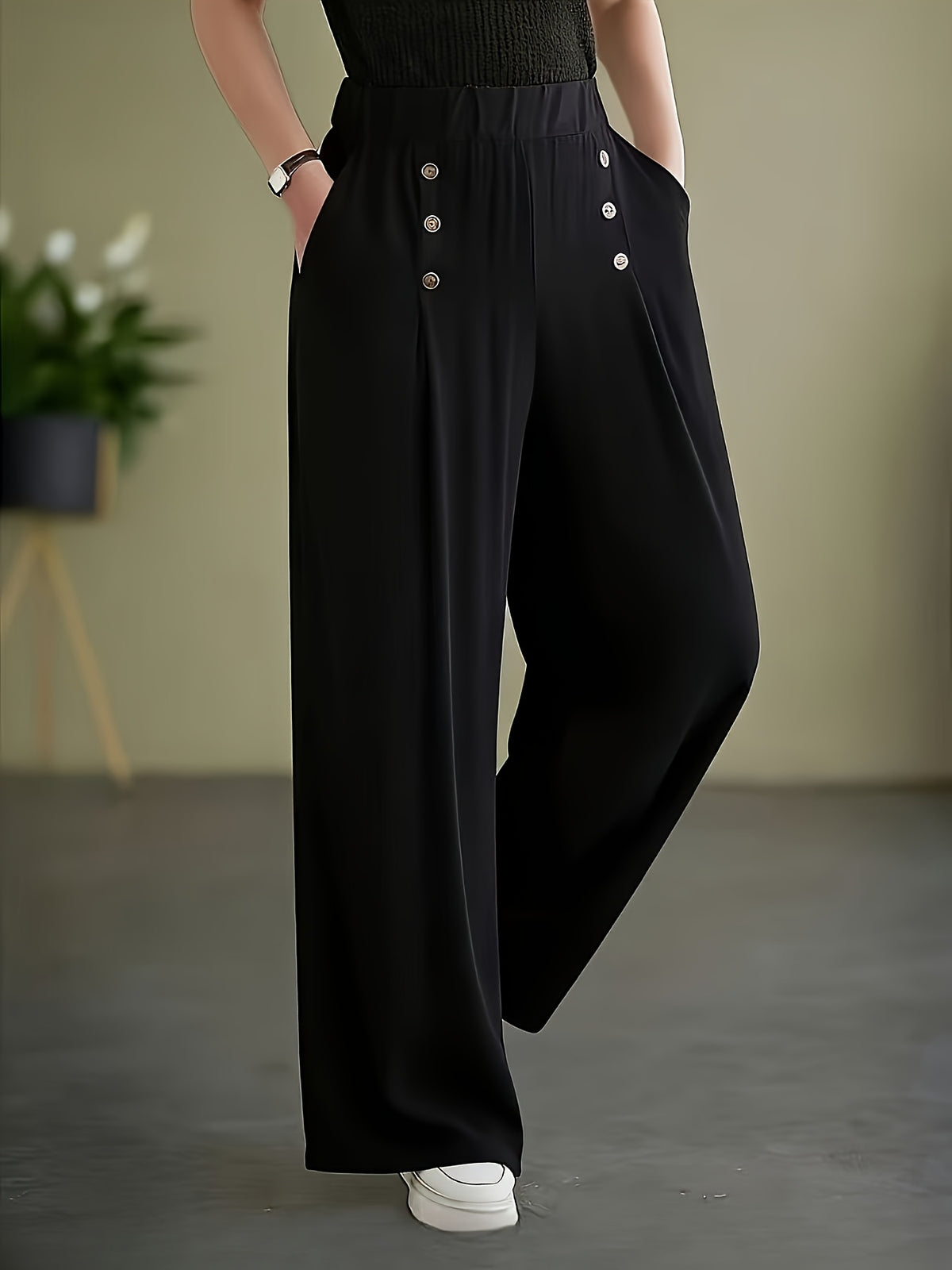 Pantalon grande taille, coupe évasée, poches plaquées, vu de dos