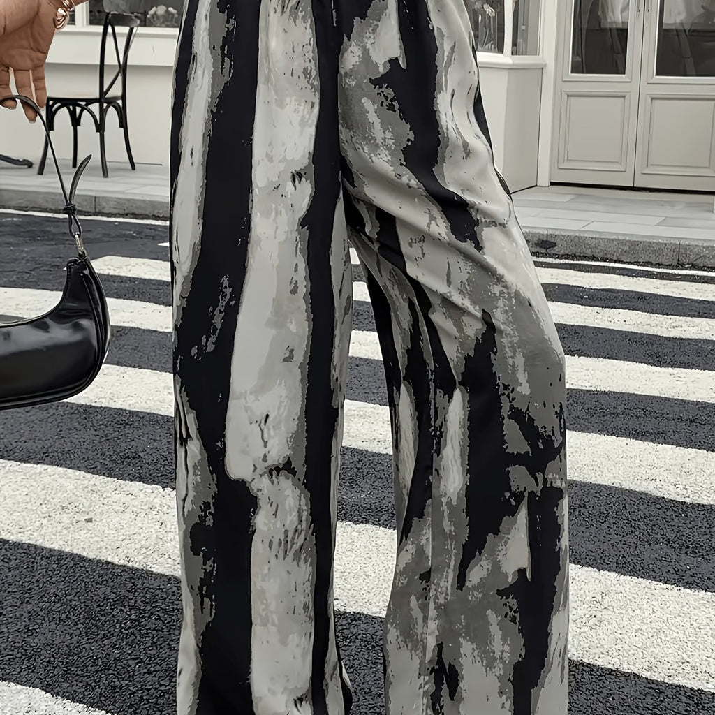 Pantalon grande taille, coupe évasée, allure élégante — matière : polyester
