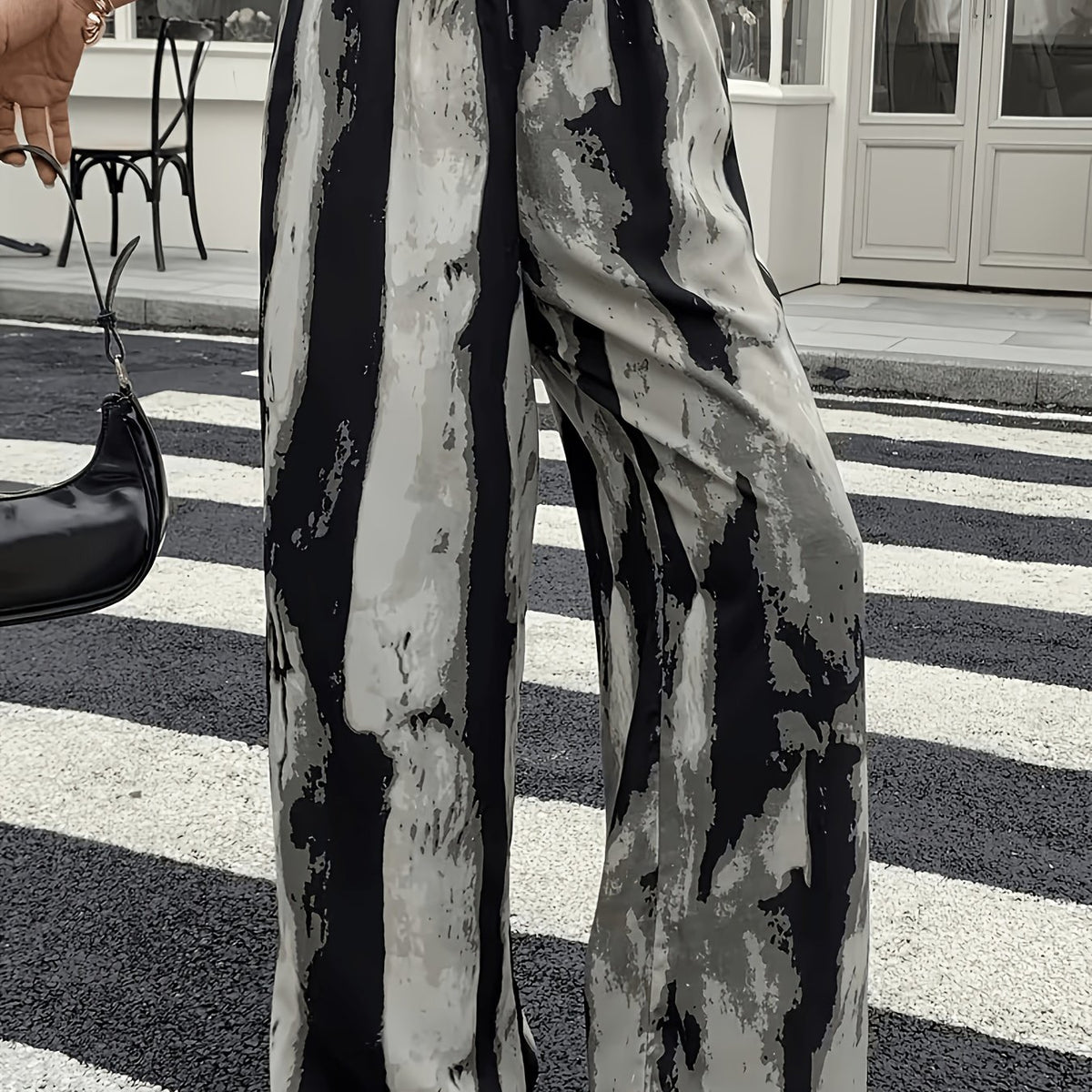 Pantalon grande taille, coupe évasée, allure élégante — matière : polyester