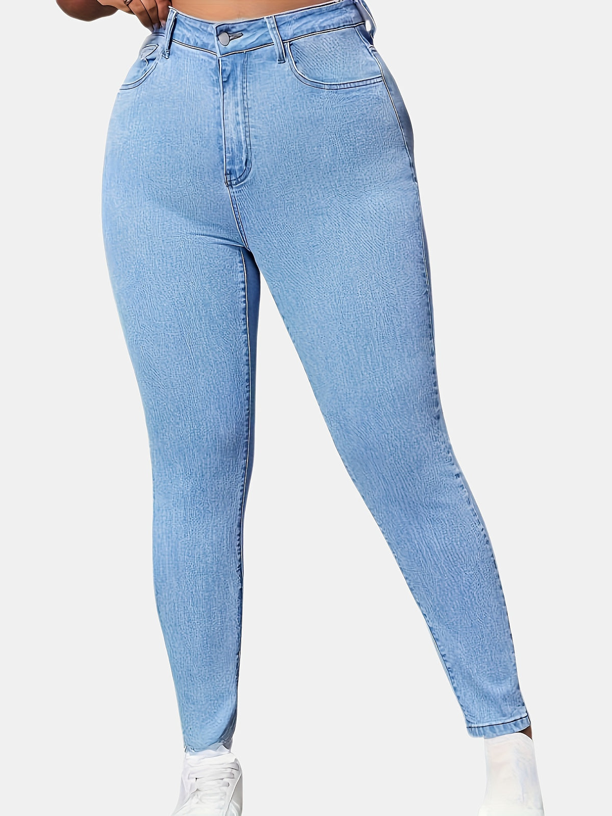 Jean grande taille, coupe longue, tombé fluide, détail du tissu
