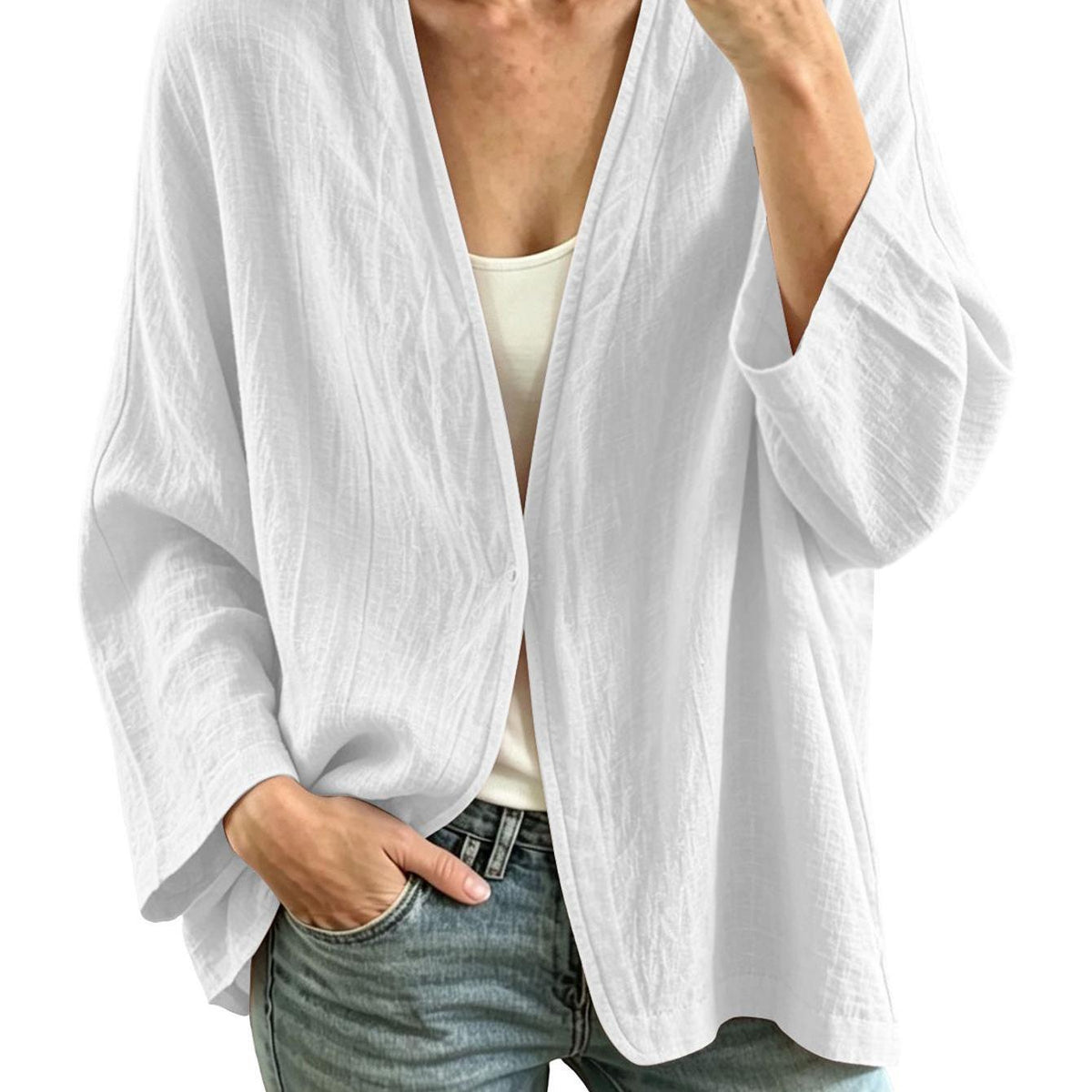 Veste grande taille en lin, coupe ample, encolure nette, manches longues — matière : lin