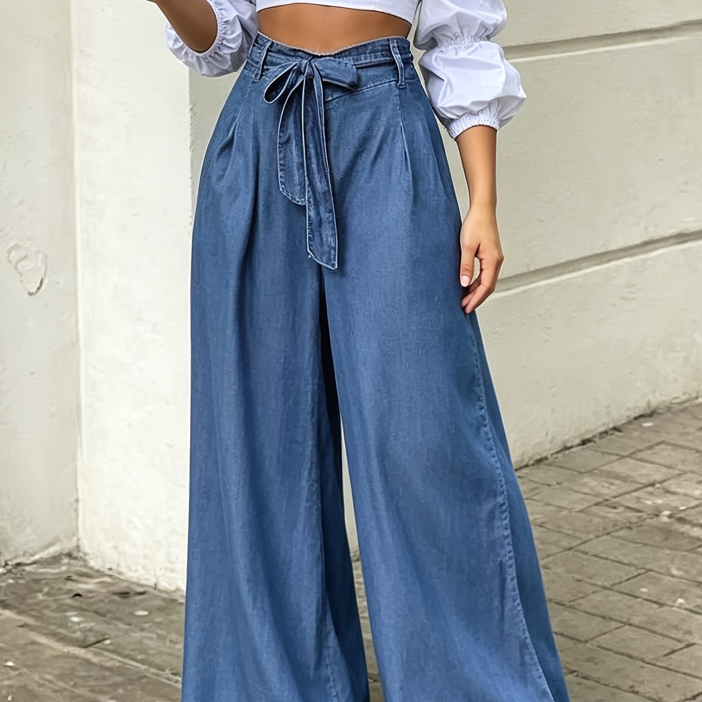 Pantalon grande taille, coupe évasée, délavage doux, tenue franche — matière : polyester