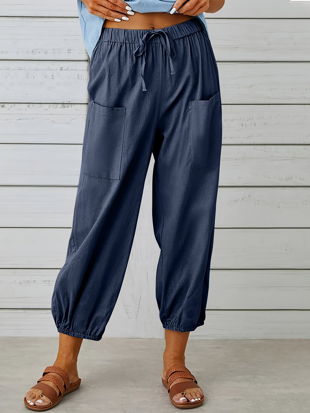 Pantalon grande taille en lin, cordon de serrage, tenue souple, détail du tissu