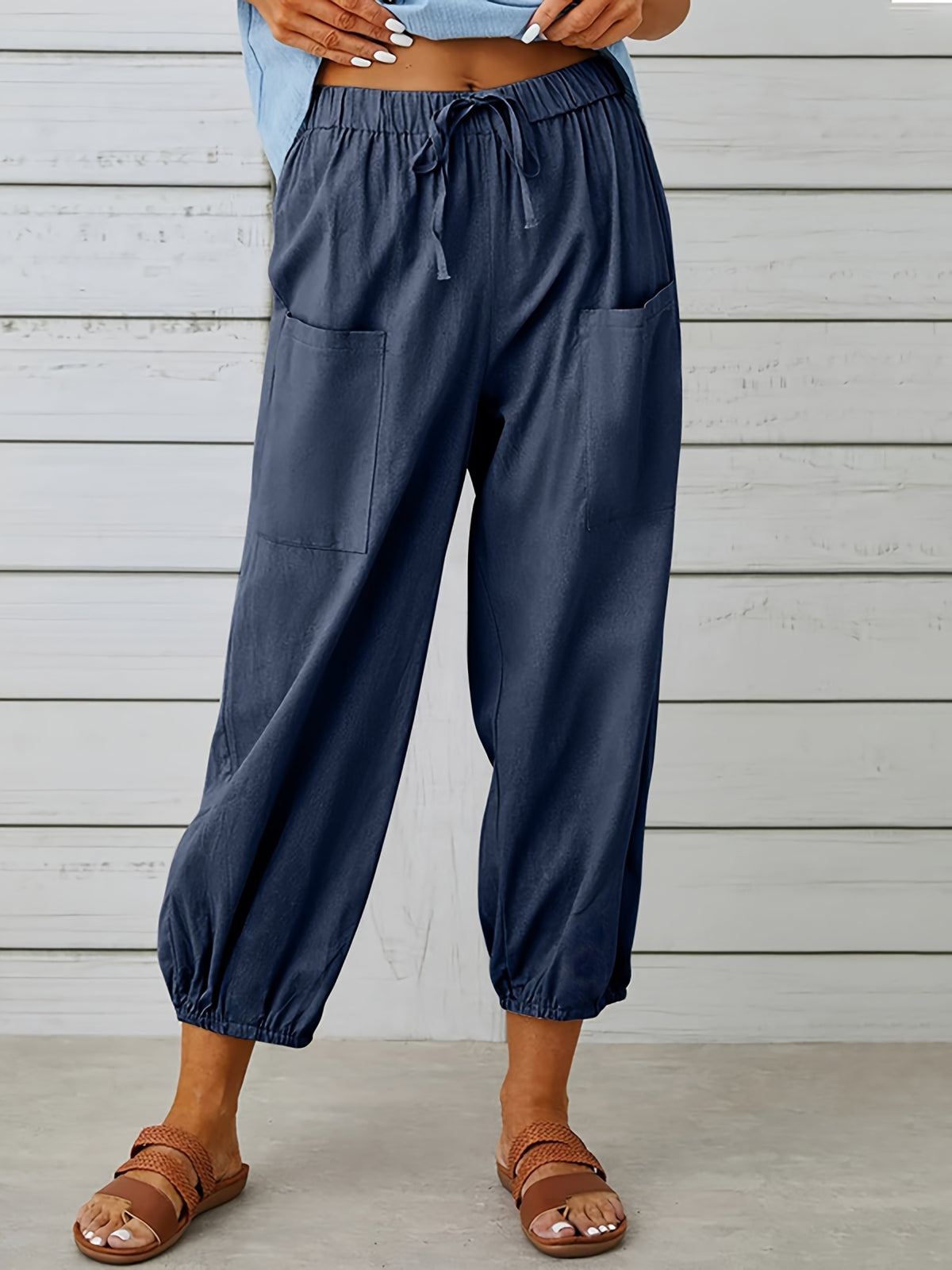 Pantalon grande taille en lin, cordon de serrage, tenue souple, détail du tissu