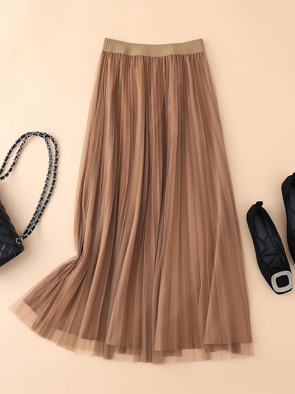 Jupe grande taille, plissés, allure élégante, mise en situation