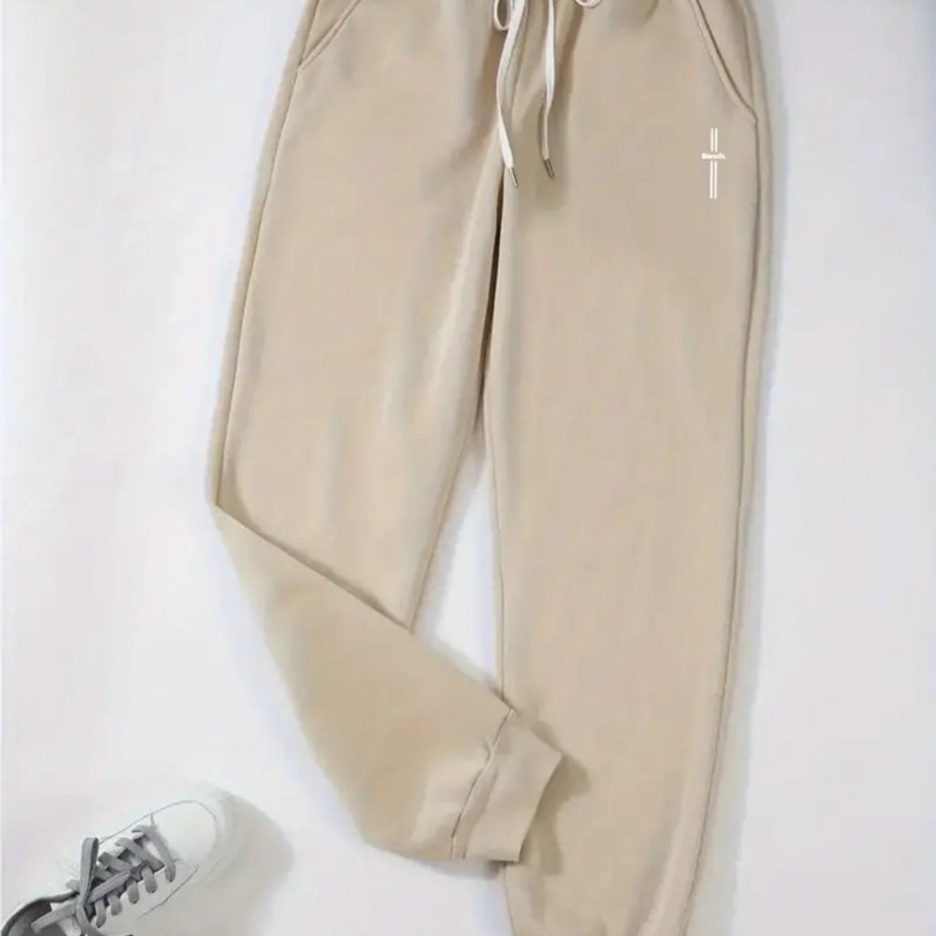 Pantalon grande taille, poches pratiques, tissu opaque
