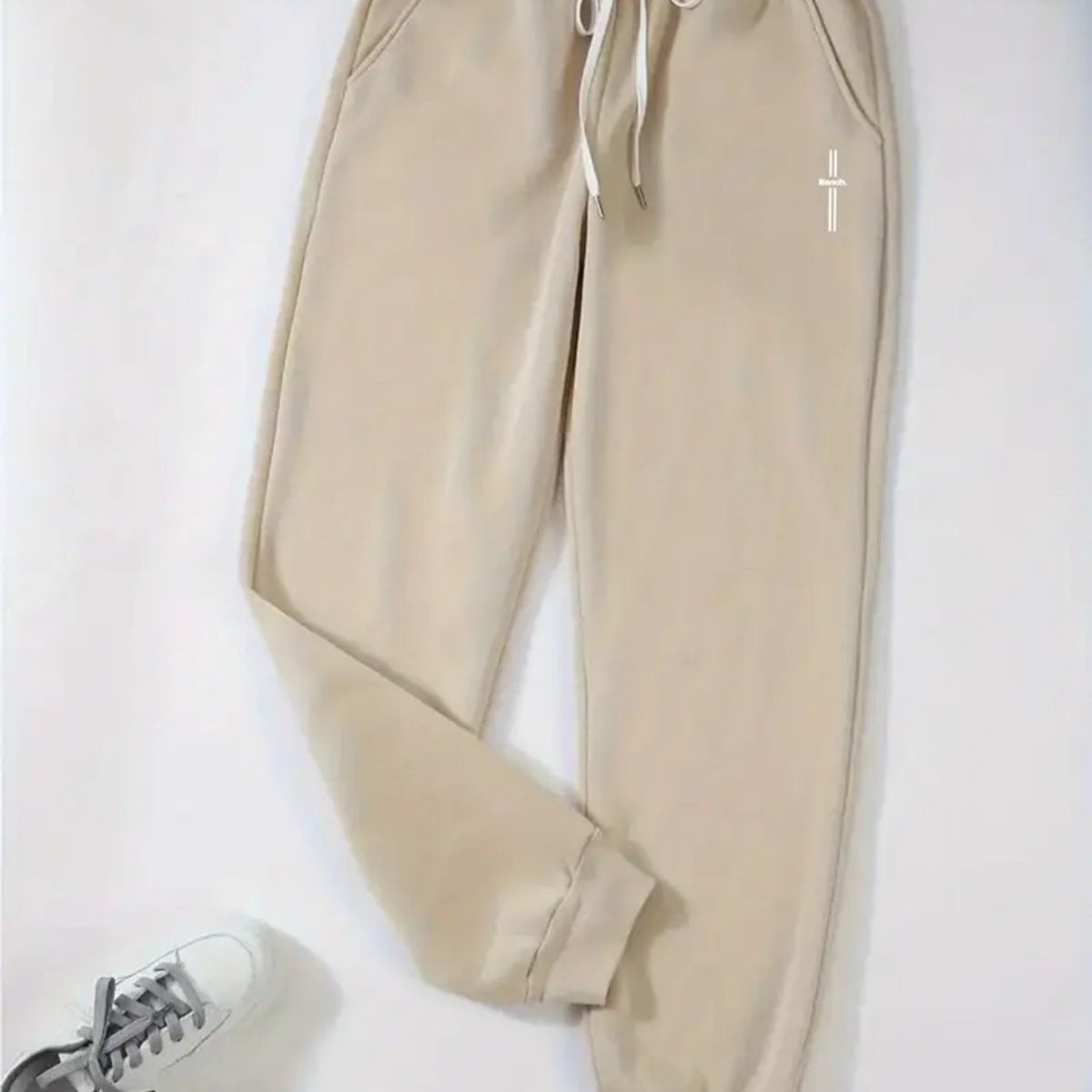 Pantalon grande taille, poches pratiques, tissu opaque
