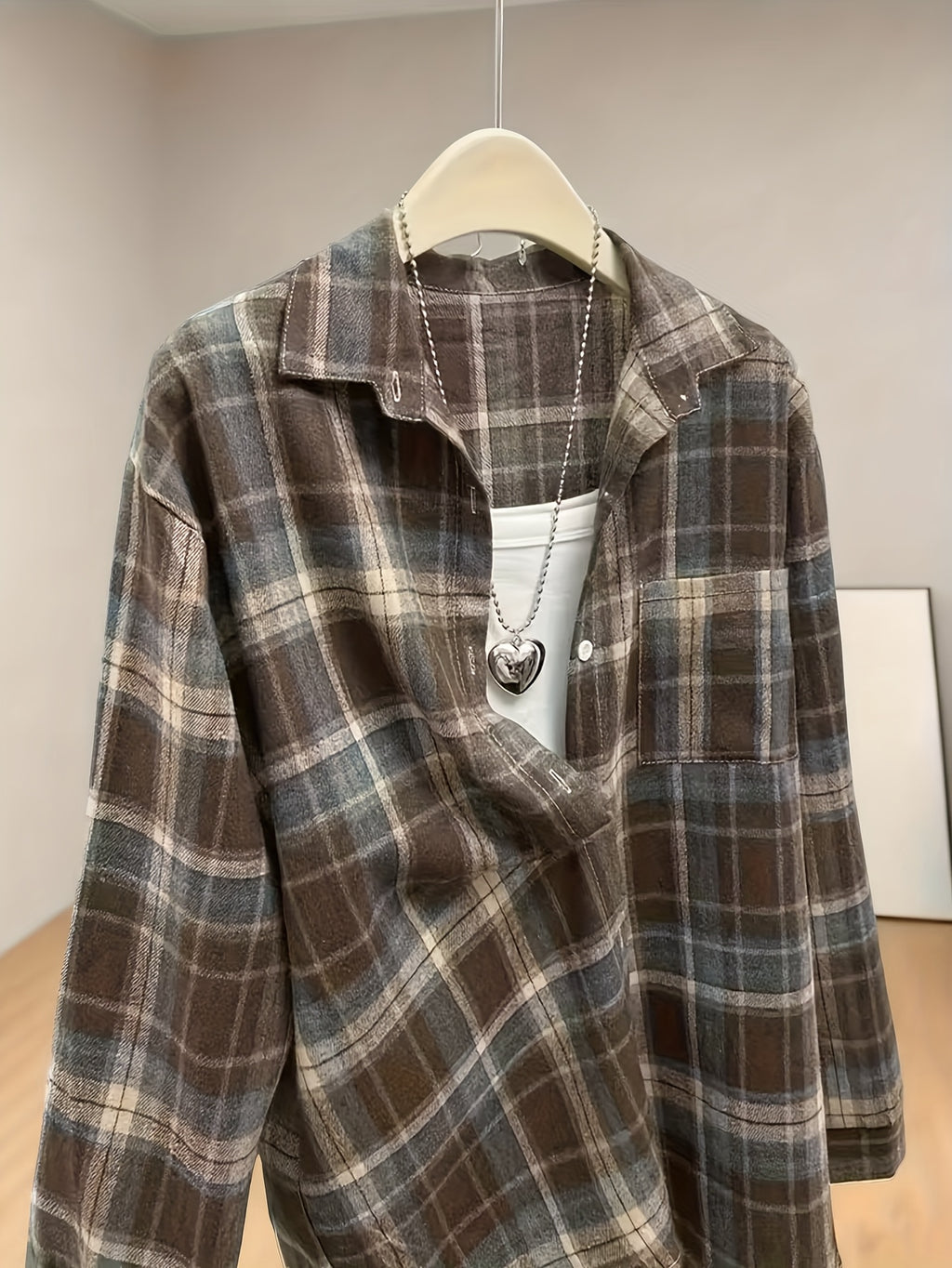 Chemise grande taille à carreaux, coupe ample, poches pratiques, autre coloris