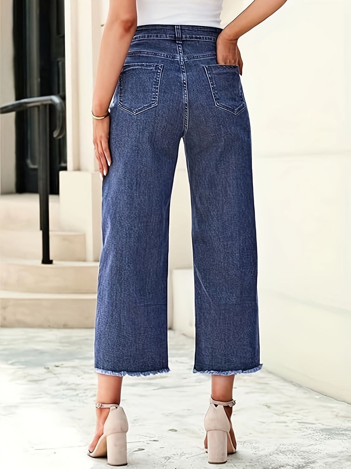 Jean grande taille, coupe évasée, tombé fluide, jambe large, tissu opaque