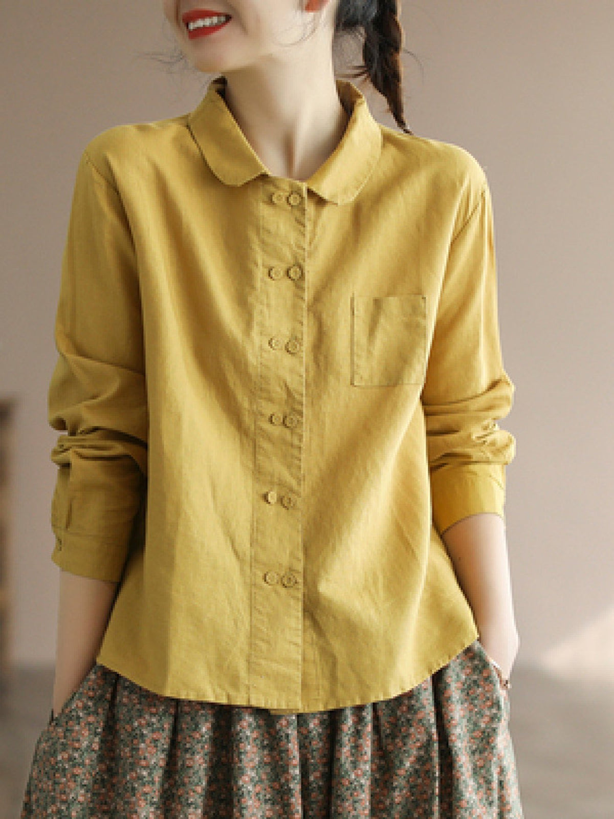 Chemise grande taille en lin, coupe ample, manches longues, tenue souple, détail du tissu