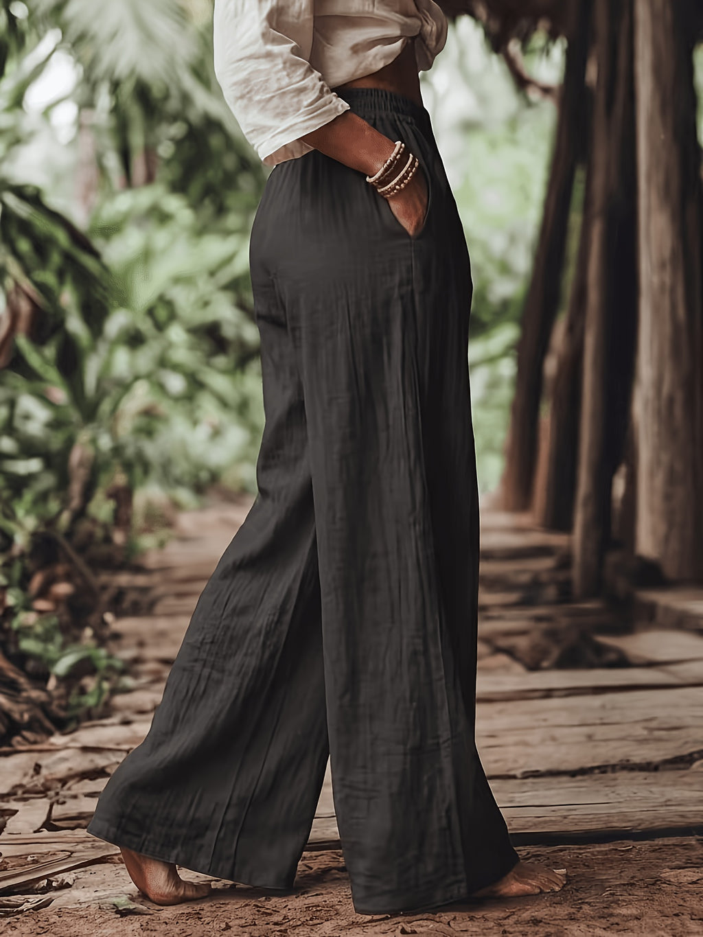 Pantalon grande taille, coupe évasée, toucher naturel, jambe large, vue de profil