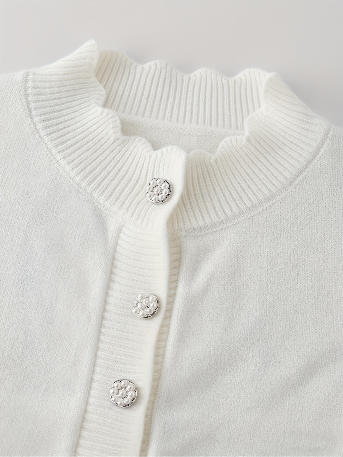 Gilet grande taille, volants, tombé fluide, chaleur d'hiver, détail du tissu