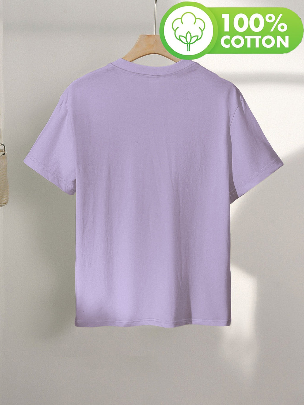 T-shirt grande taille, coupe ample, col rond, manches courtes, vue de profil