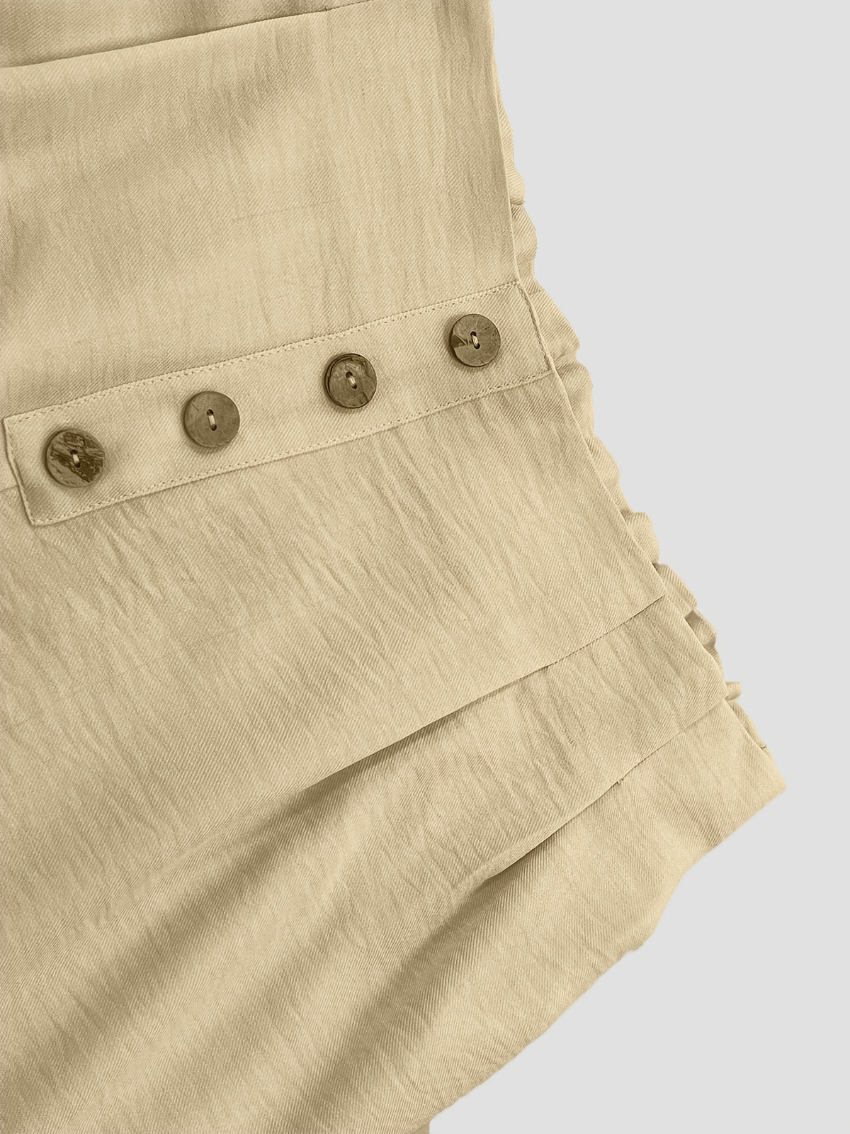 Pantalon grande taille, fermeture zippée, jambe large, porté de face