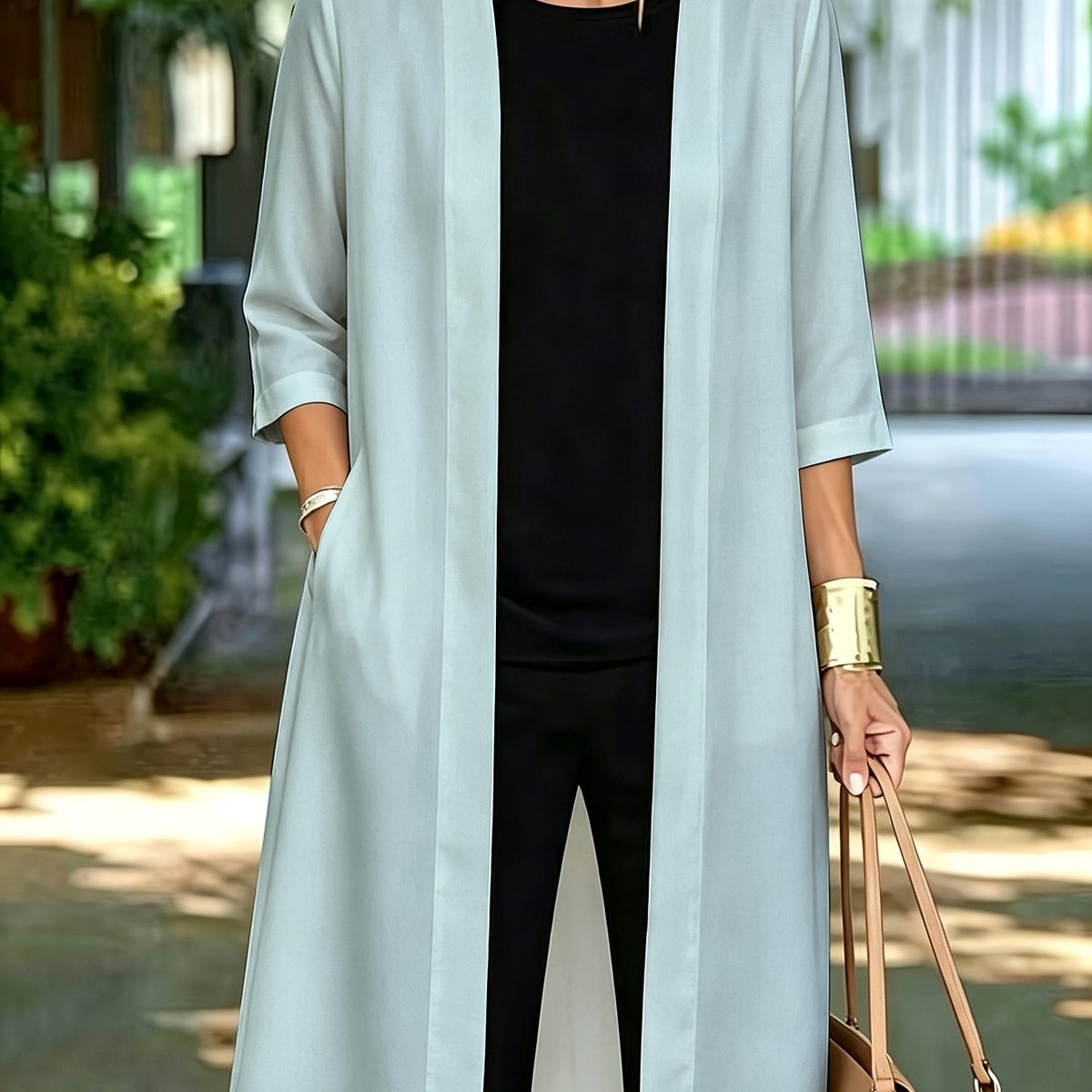 Veste grande taille, coupe ample, poches pratiques, esprit trench — matière : polyester