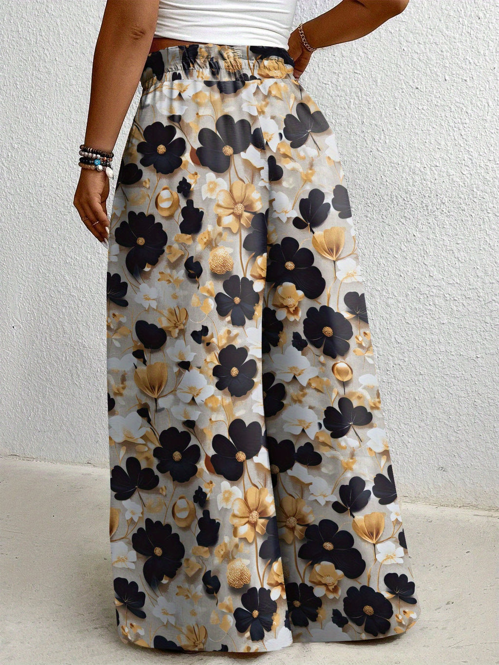 Pantalon grande taille à imprimé fleuri, coupe évasée, cordon, détail du tissu