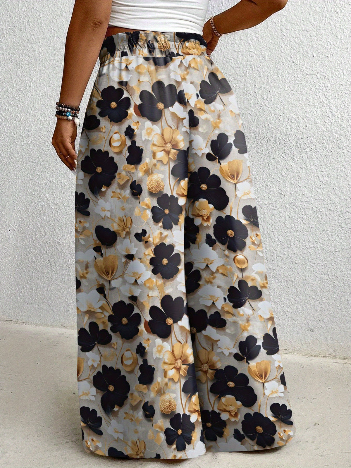 Pantalon grande taille à imprimé fleuri, coupe évasée, cordon, détail du tissu