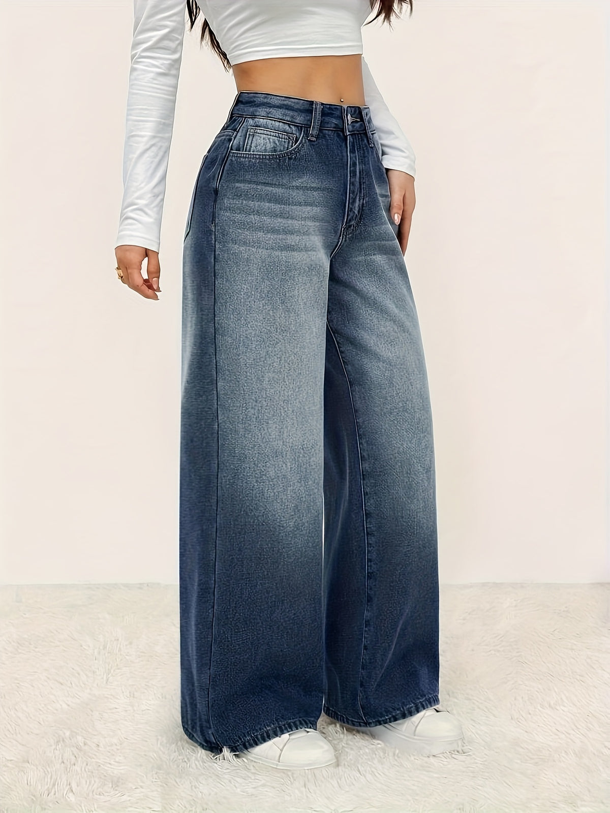 Jean grande taille, coupe évasée, tenue franche, chaleur d'hiver, détail du col
