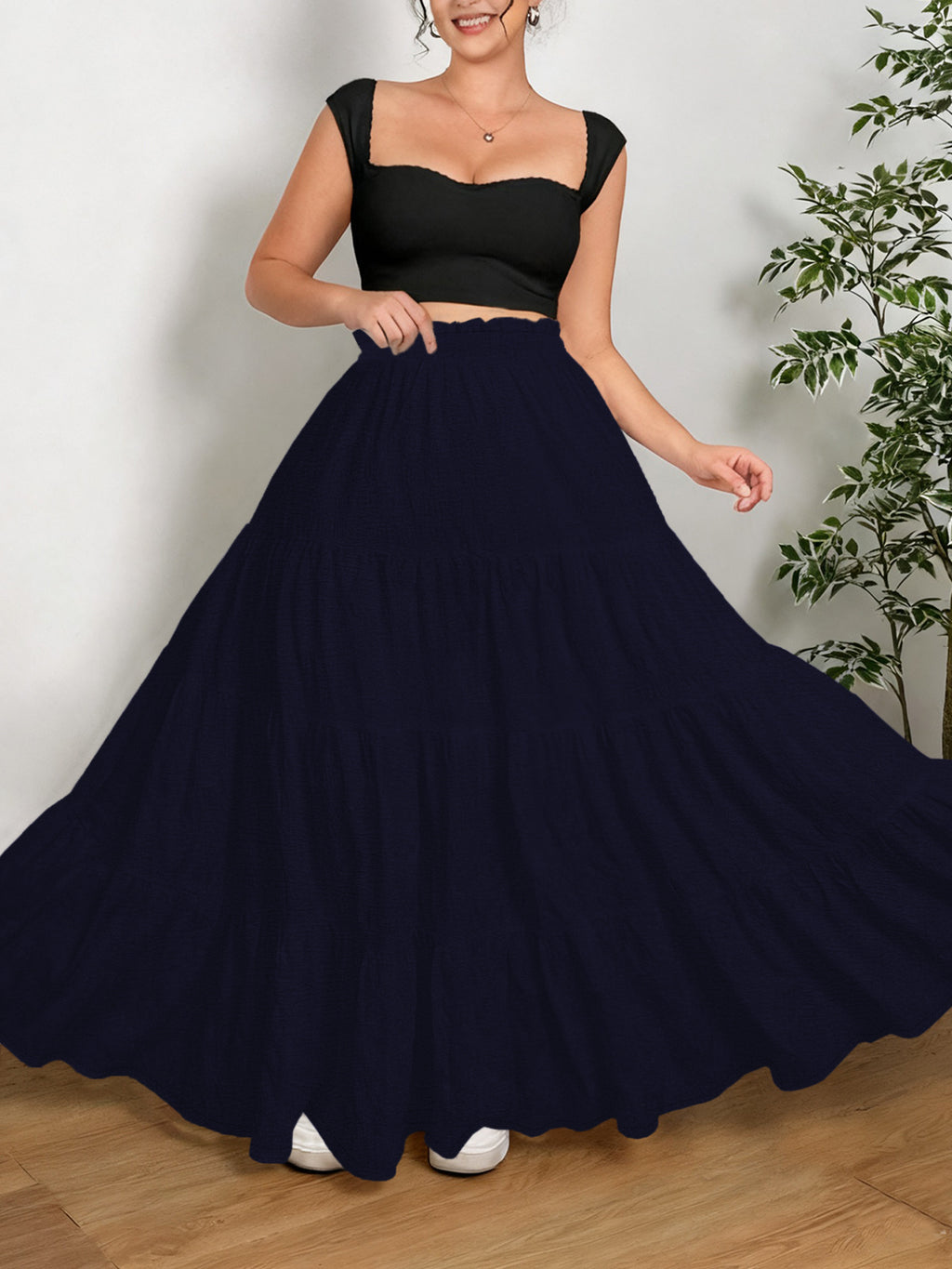 Jupe grande taille, coupe évasée, allure élégante, détail du tissu