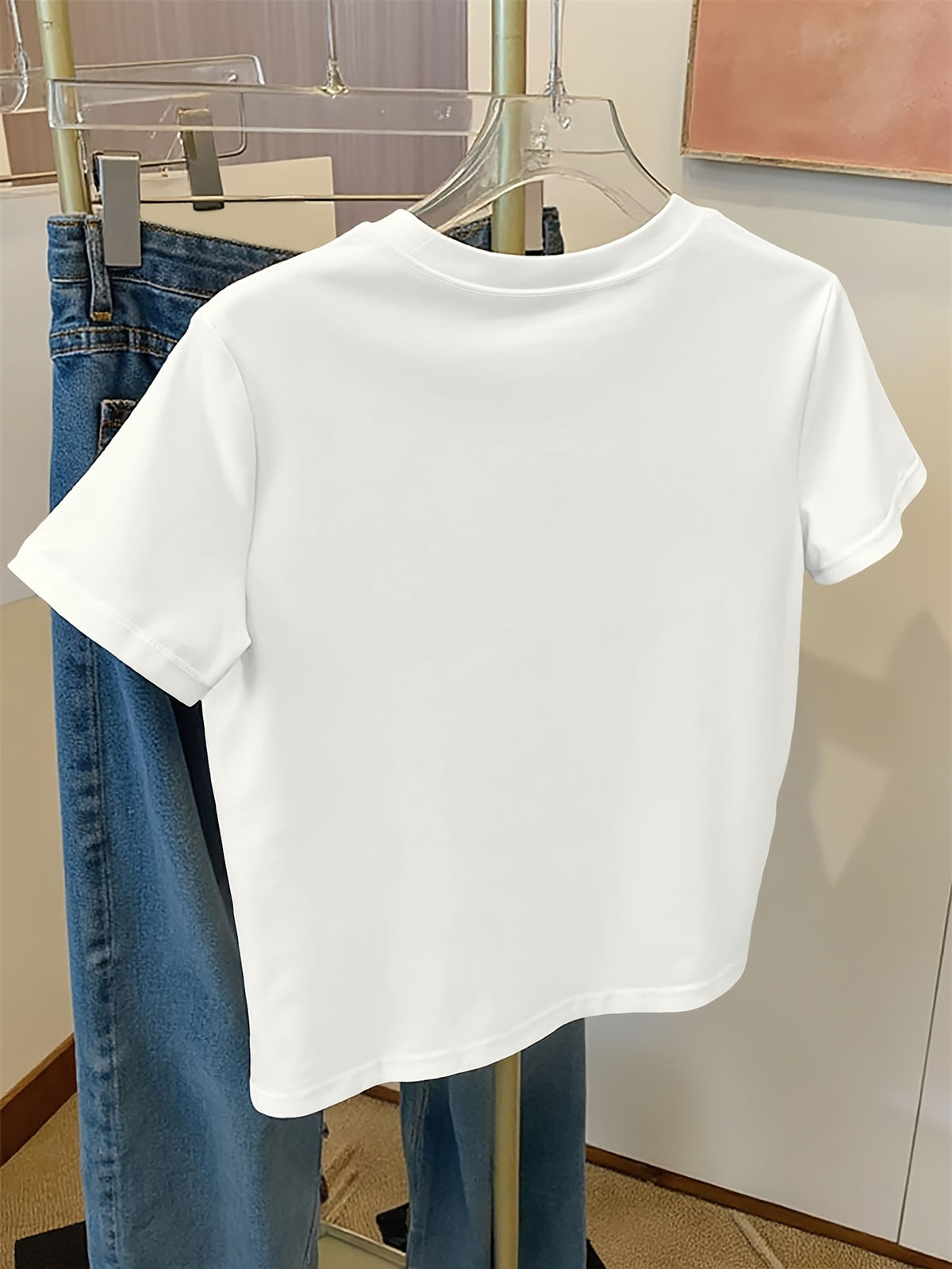 Top grande taille, col rond, manches courtes, toucher naturel, vu de dos