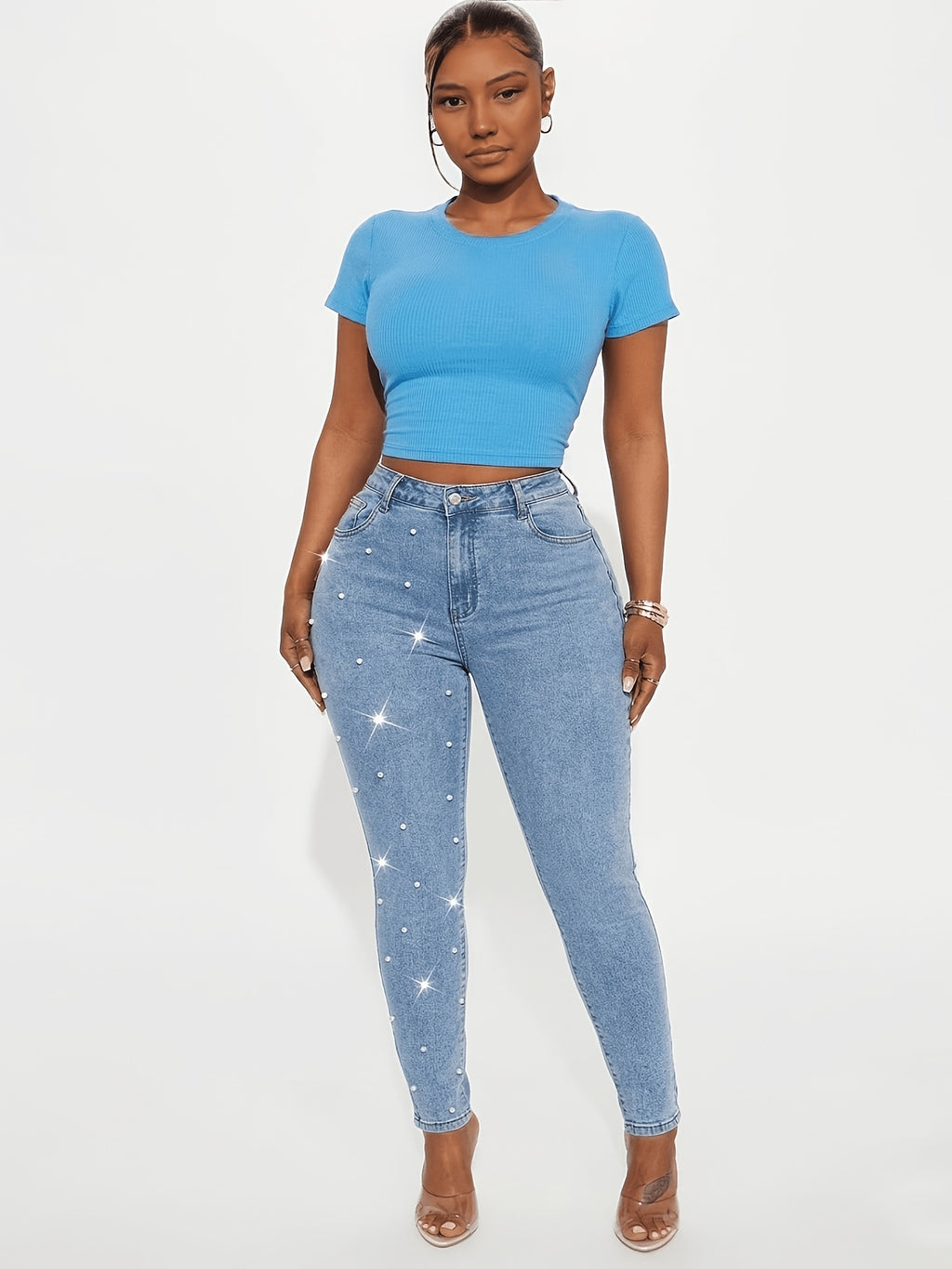 Jean grande taille, coupe ajustée, toucher naturel, vu de dos