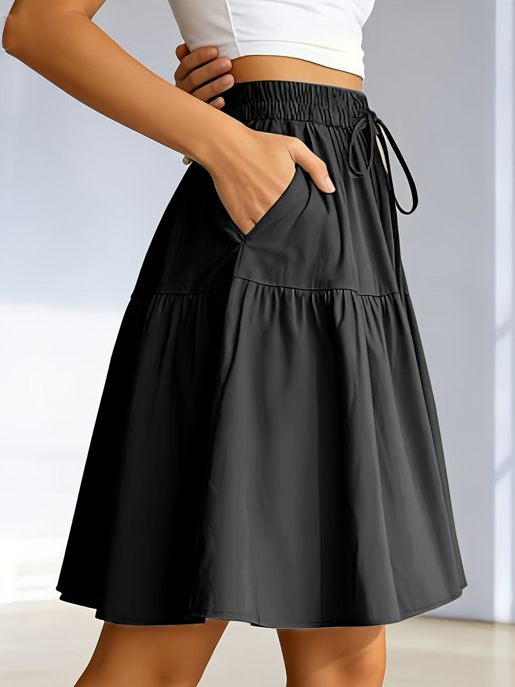 Jupe grande taille, coupe cintrée, poches pratiques, ligne nette, tissu opaque