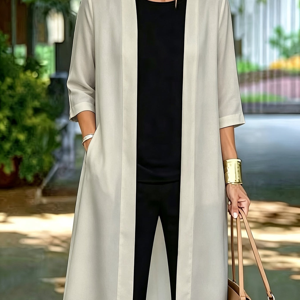 Veste grande taille, coupe ample, poches pratiques, esprit trench, détail du tissu