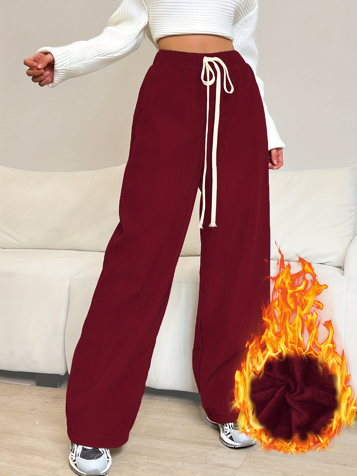 Pantalon grande taille en velours côtelé, coupe évasée, cordon, gros plan
