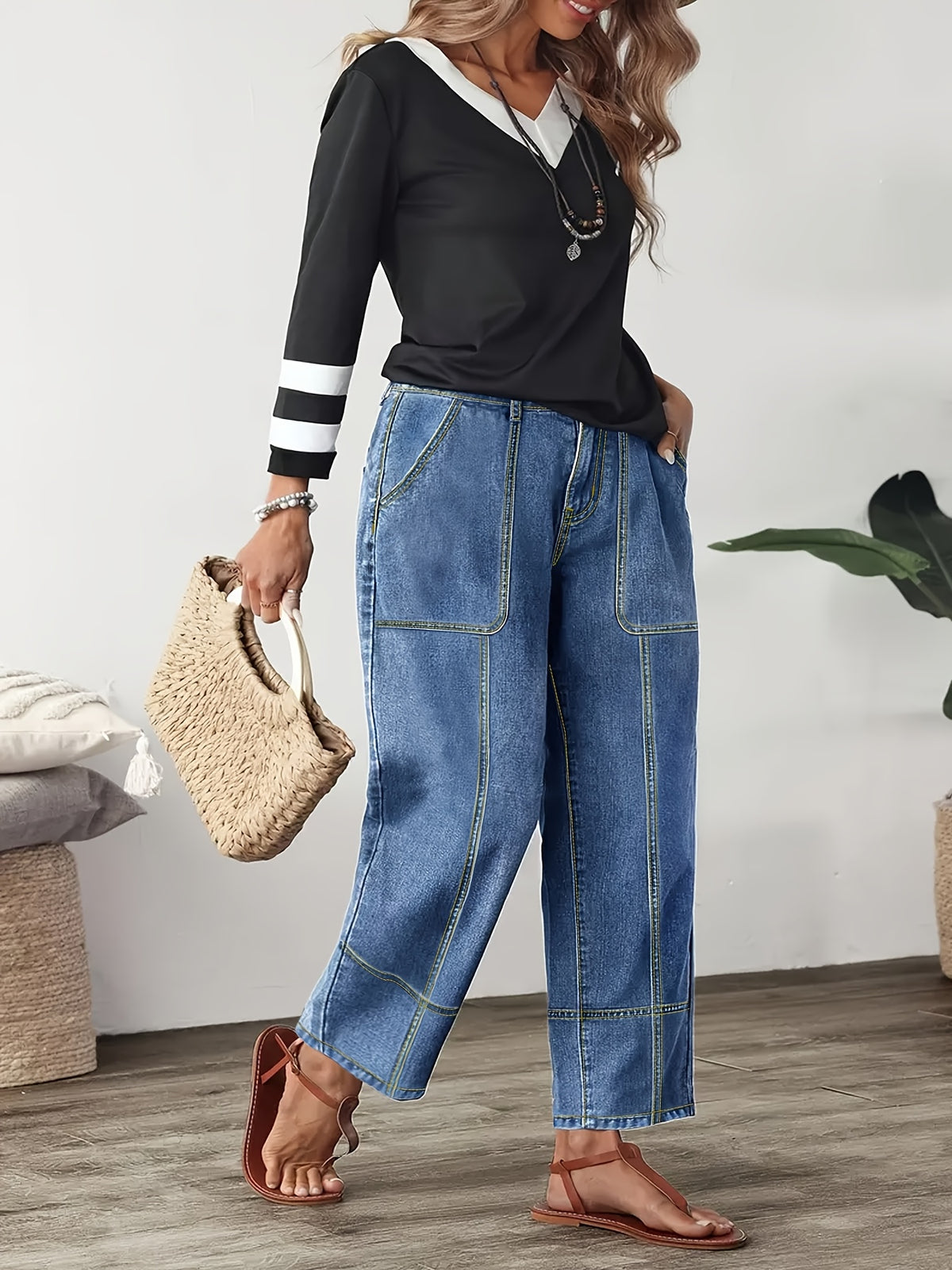 Pantalon grande taille, coupe oversize, poches pratiques, tombé fluide, porté de face