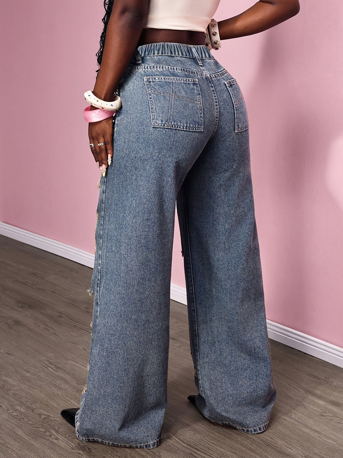 Pantalon grande taille, coupe évasée, toucher naturel, délavage — composition : 55.3% Polyester, 44.7% Coton Image