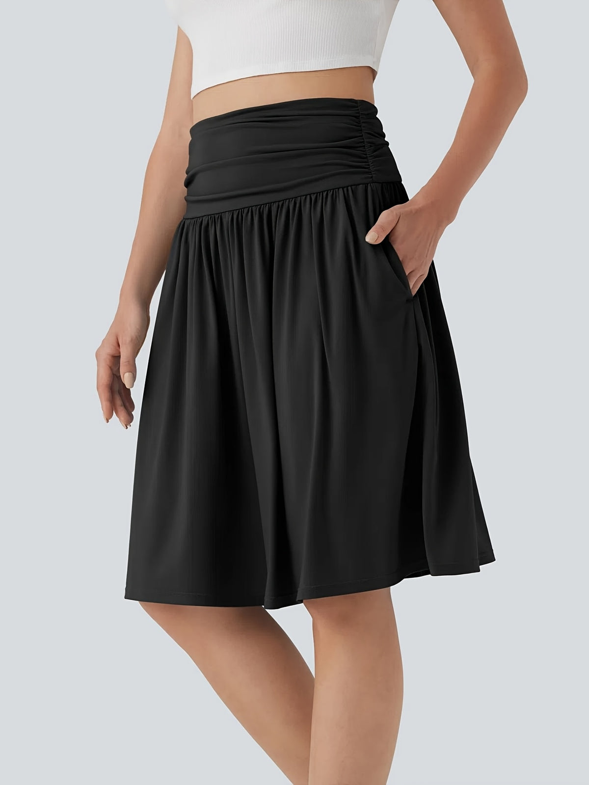 Jupe grande taille, coupe évasée, poches pratiques, mise en situation