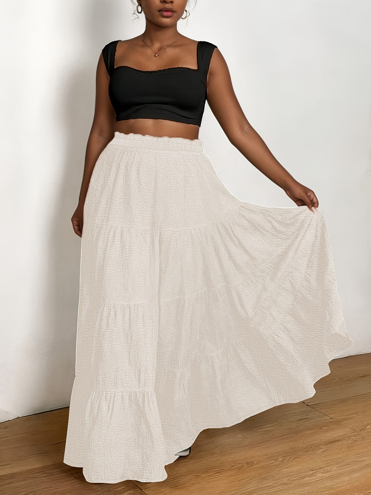 Jupe grande taille, coupe évasée, allure élégante, mise en situation