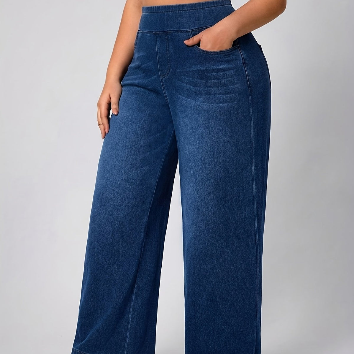 Pantalon grande taille, coupe évasée, délavage doux, tenue franche — matière : denim