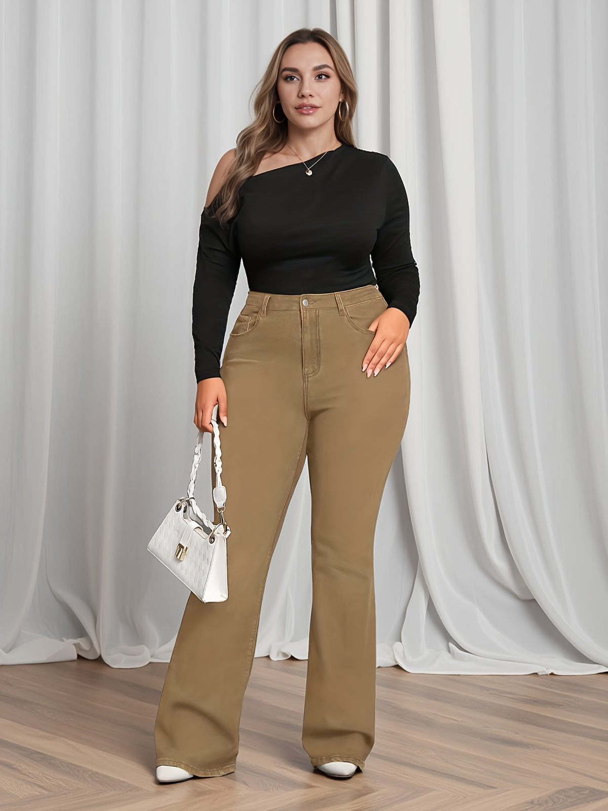 Jean grande taille, coupe évasée, boutonnage, tenue franche