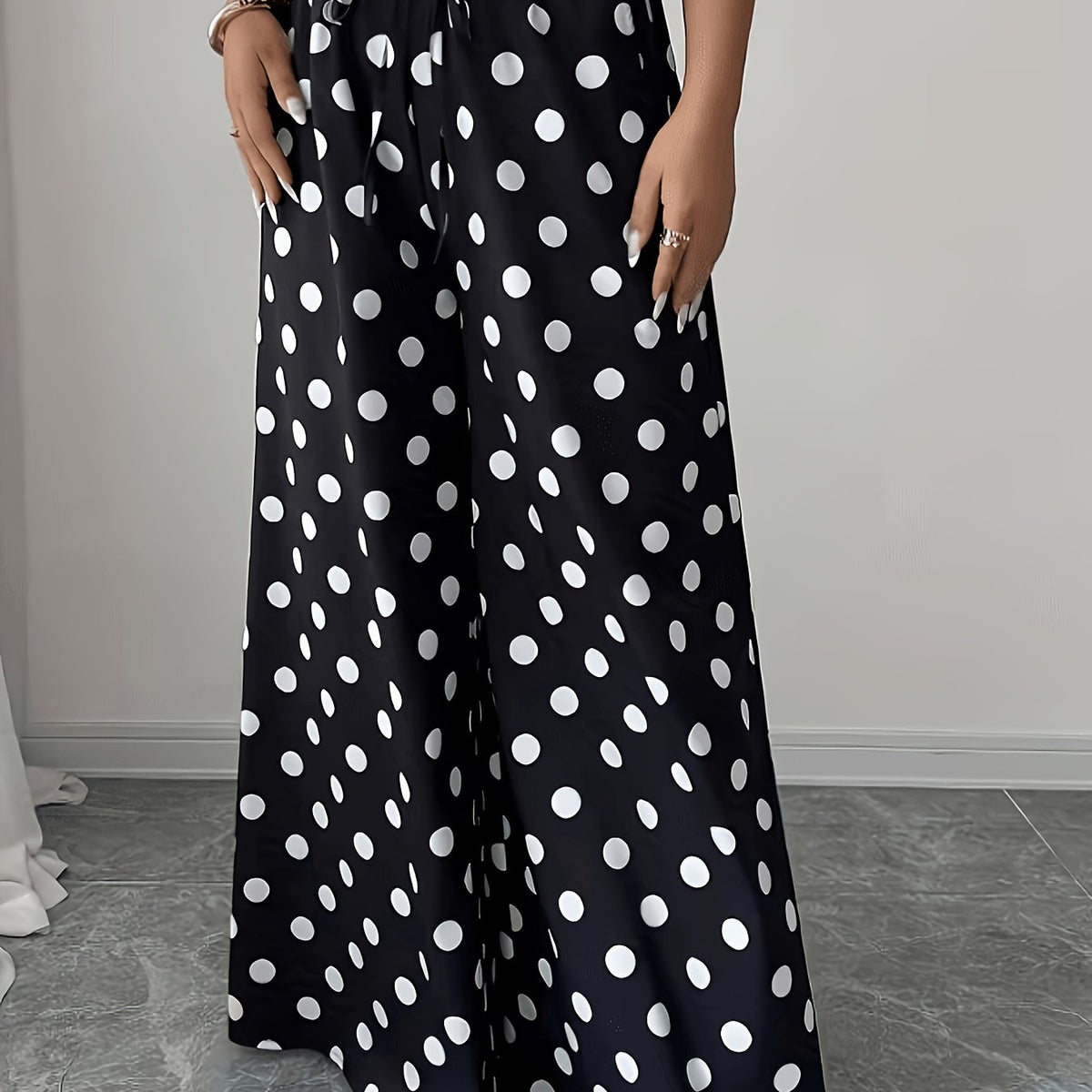 Pantalon grande taille à pois, coupe évasée — matière : polyester Image