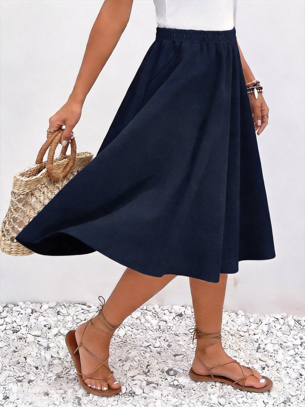 Jupe grande taille, coupe évasée, longueur genou, allure élégante, autre coloris