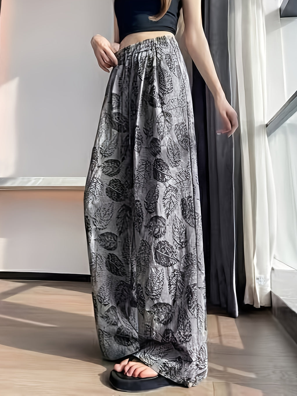 Pantalon grande taille, coupe évasée, tombé fluide, tissu opaque