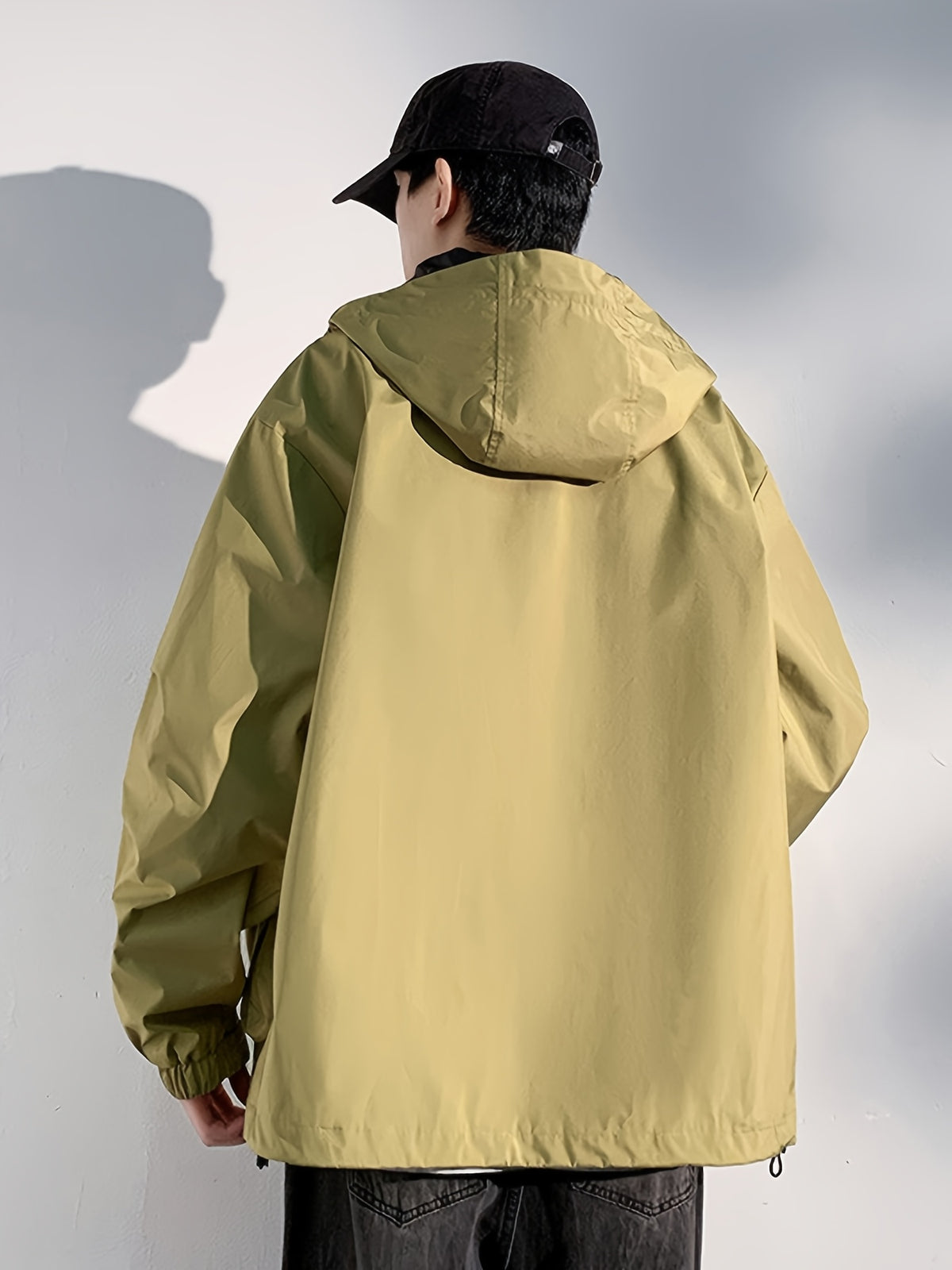 Veste grande taille, coupe ample, épaules dénudées, poches pratiques, détail du tissu