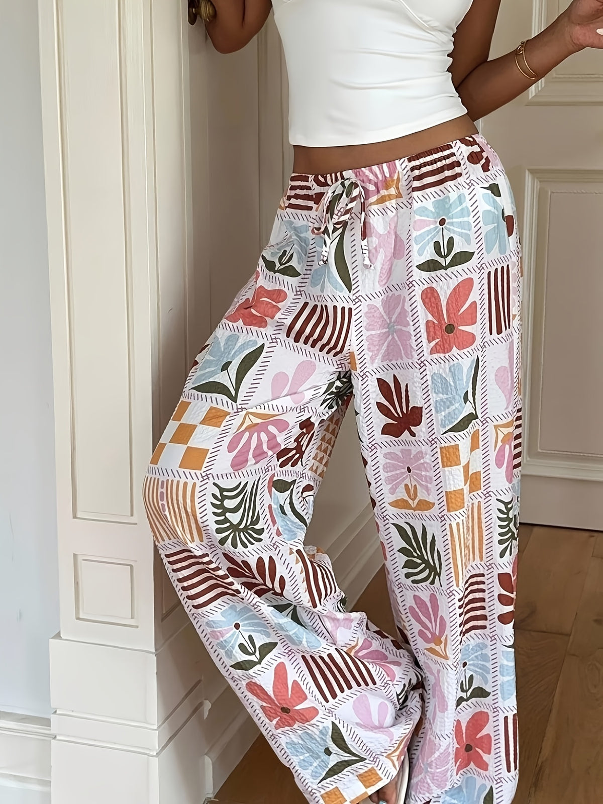 Pantalon grande taille à imprimé fleuri, coupe évasée, cordon de serrage Image