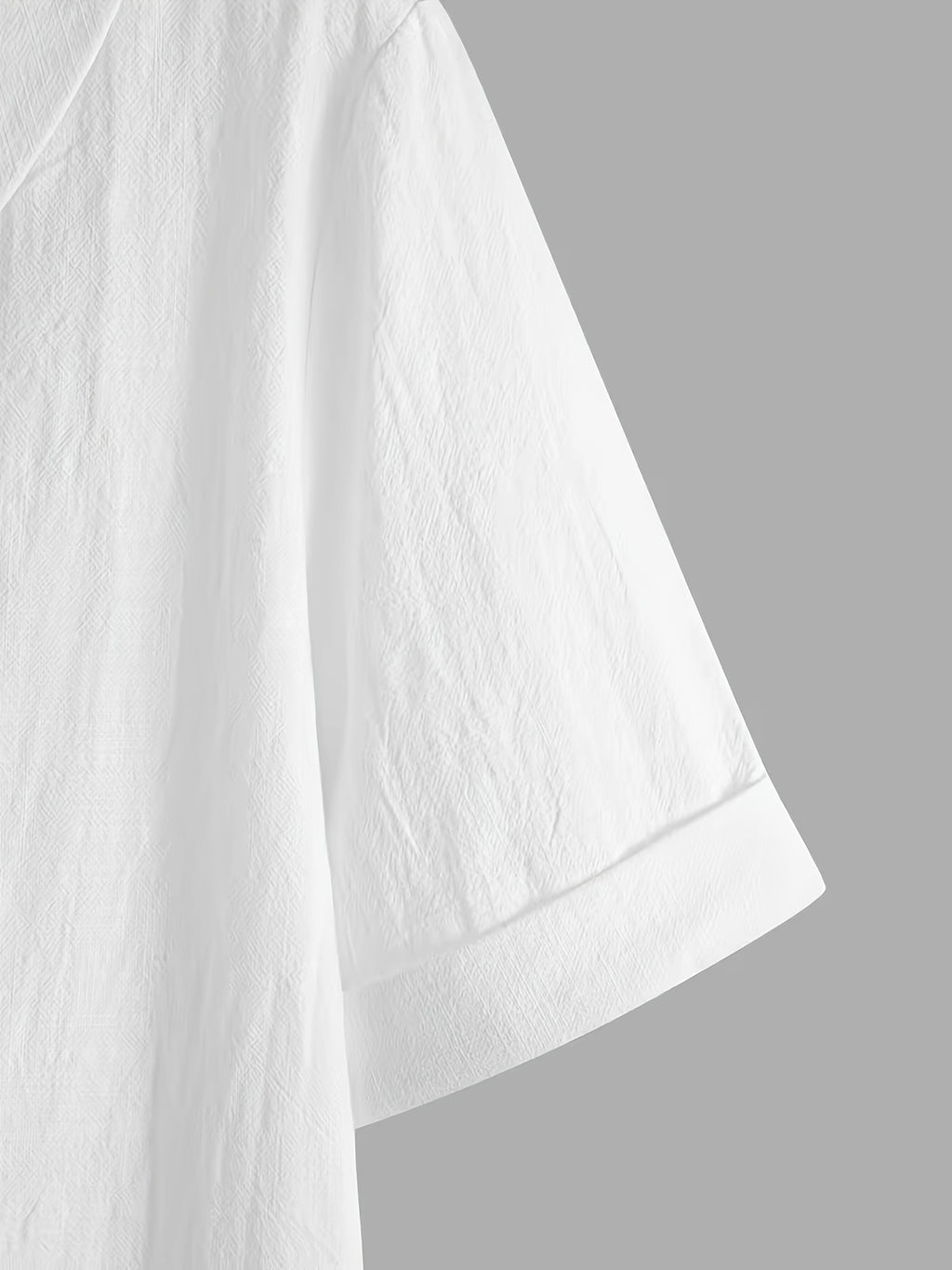 Pull grande taille, manches courtes, toucher naturel, détail du tissu