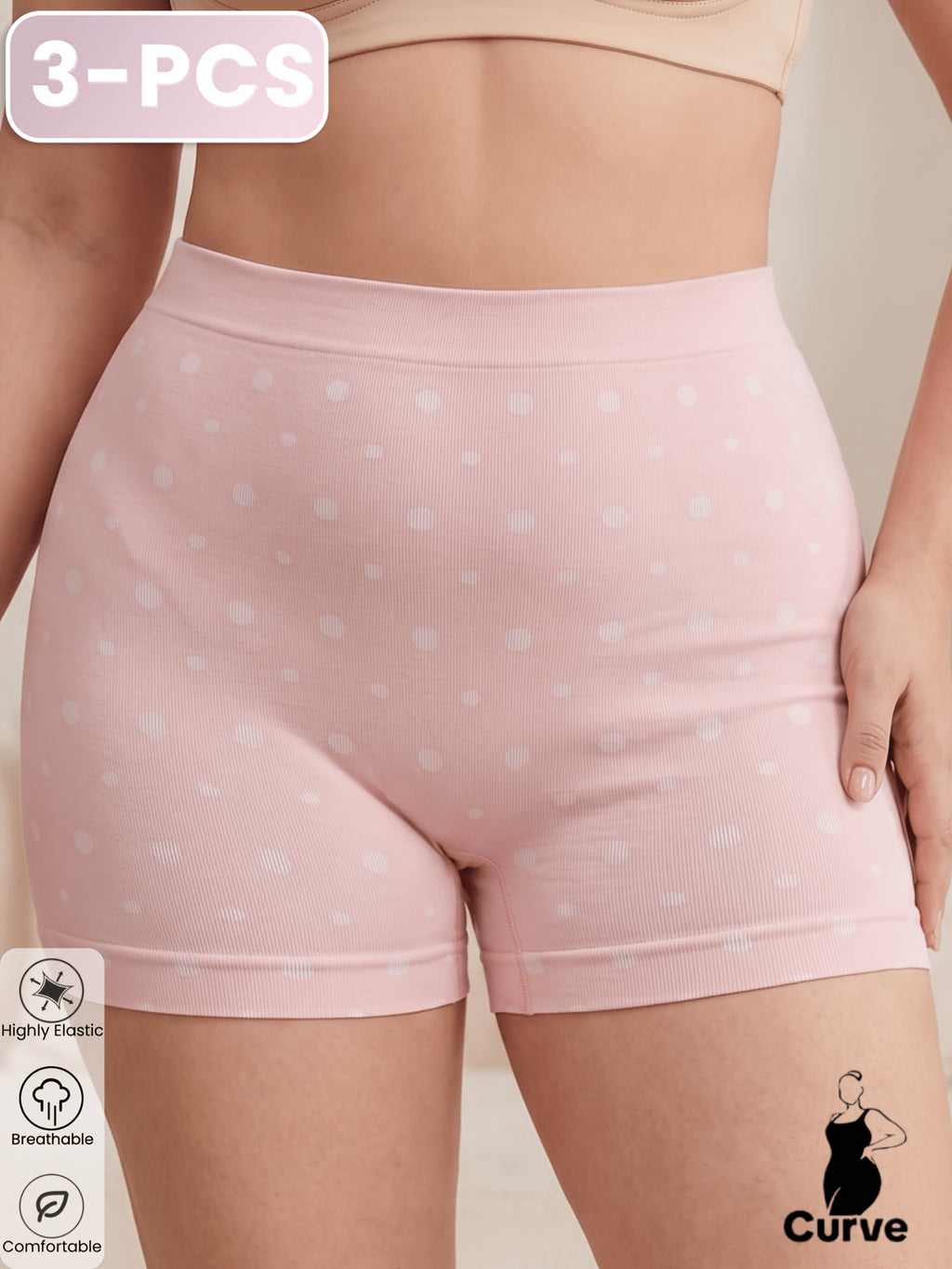 Culotte grande taille à pois, ligne épurée, porté de face