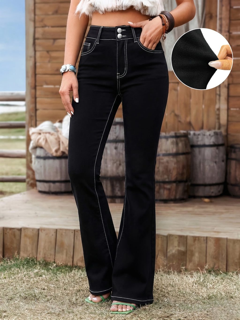 Jean grande taille à broderies, coupe oversize, tombé fluide — composition : 59.8% Viscose, 38.4% Polyester, 1.8% Élasthanne