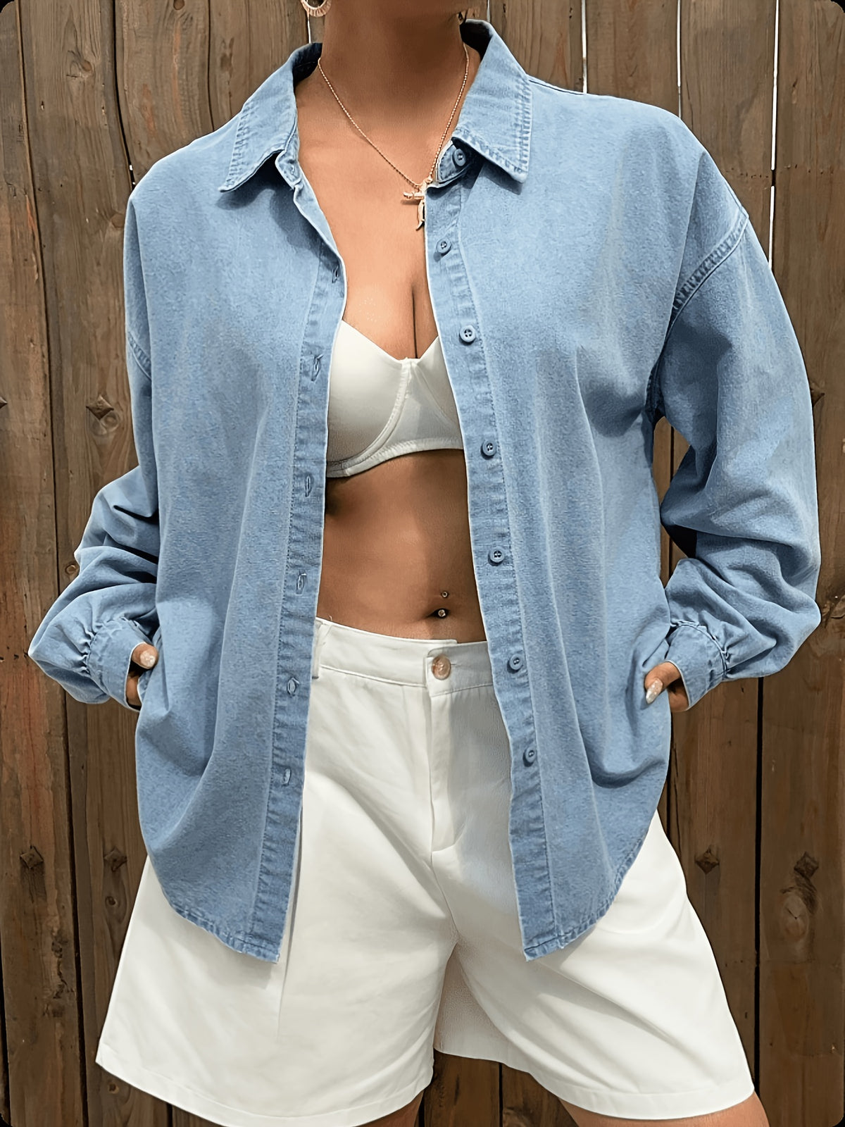 Chemise grande taille, coupe oversize, fente, tenue franche — composition : 55% Coton, 30.4% Polyester, 14.6% Autres Fibres