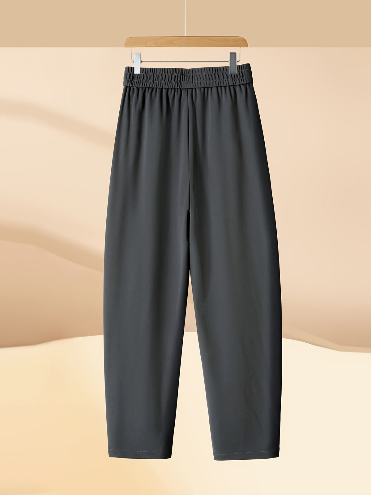 Pantalon carotte grande taille — Maille drapée et plis creux