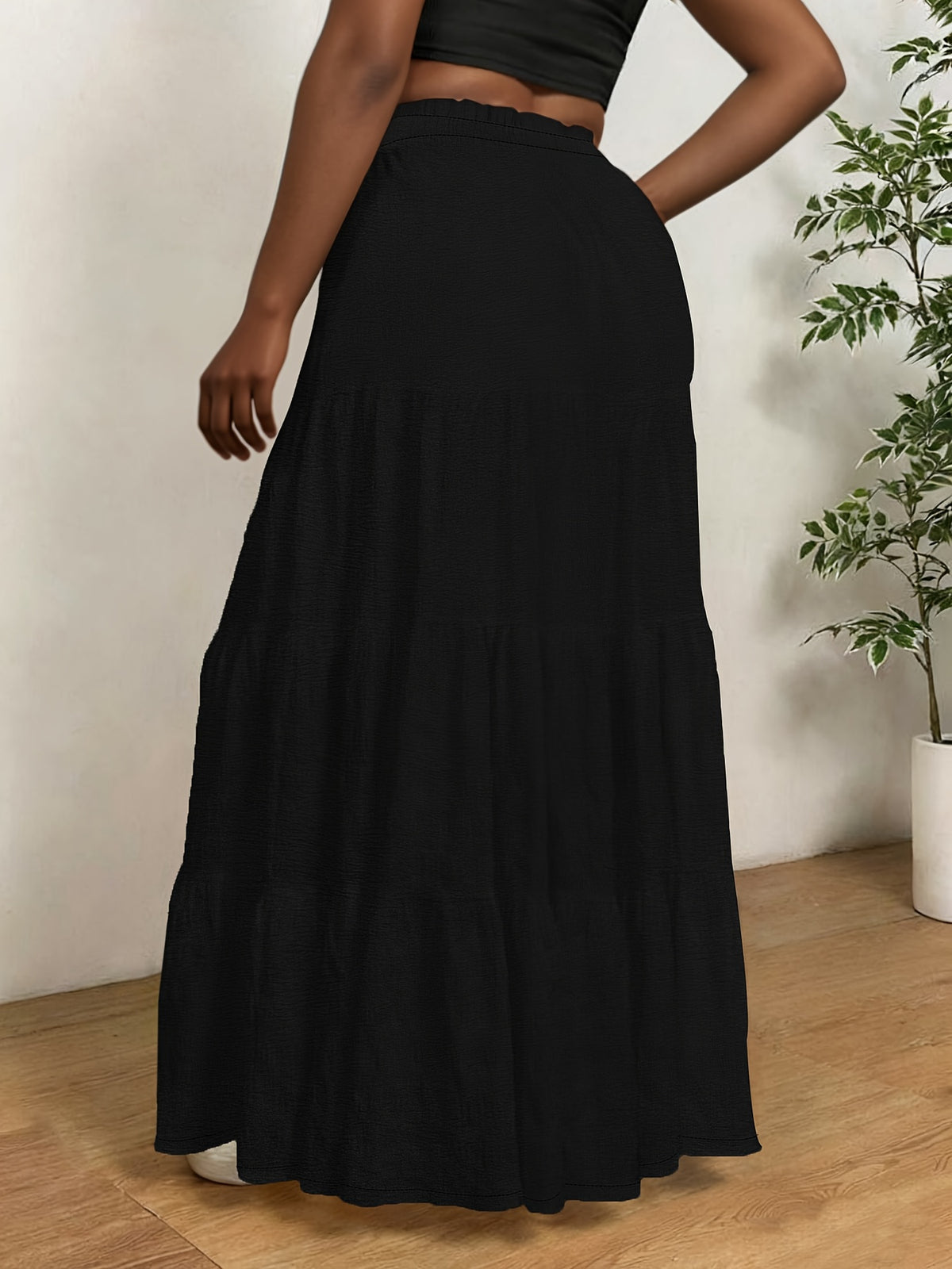 Jupe grande taille, coupe évasée, allure élégante, mise en situation
